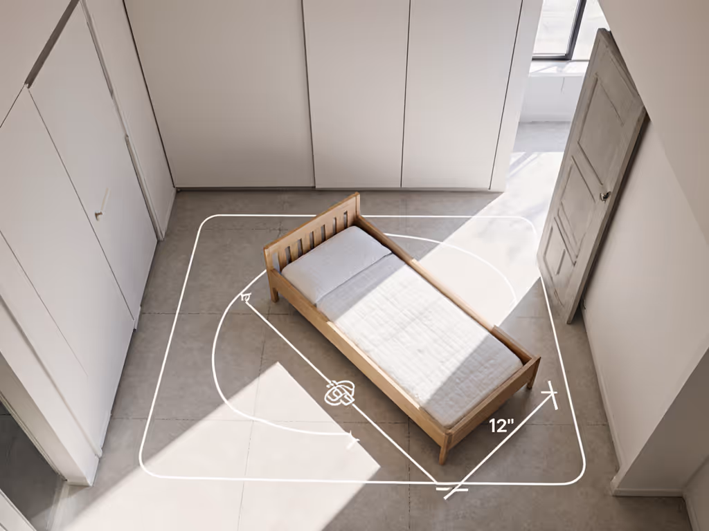 urban_toddler_bed_placement_showing_diagonal_corner_setup_with_clearance_space